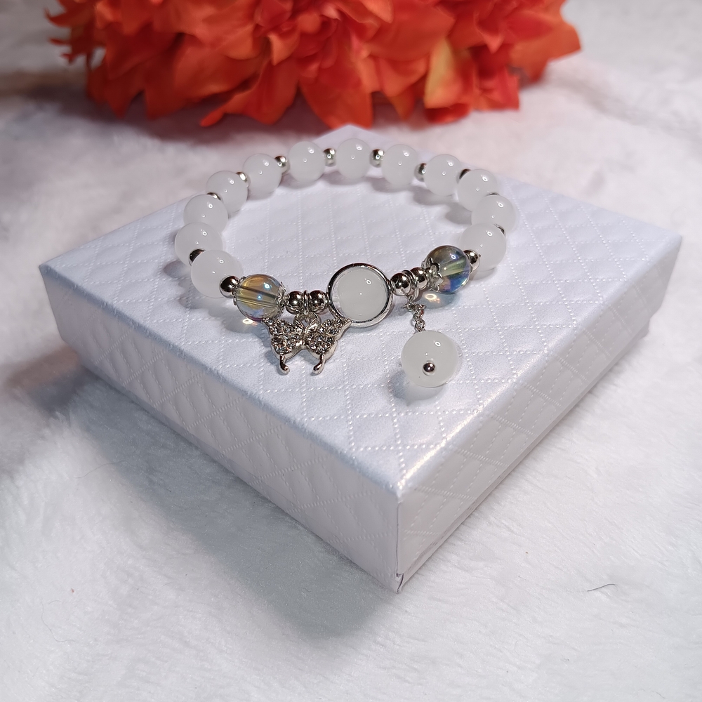 Elegant White Beaded Bracelet with Silver Butterfly Charm